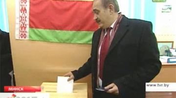 Presidential candidate Sergei Gaidukevich votes at polling station in Semkovo village