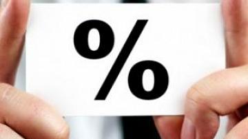National Bank reduces refinancing rate