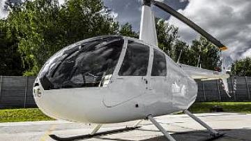 New helicopter Robinson-44 Raven II presented at DOSAAF aero club in Minsk